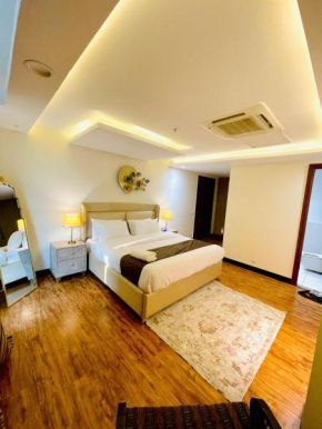 Sm suites 2bedroom apartment Goldcrest mall Dha 4